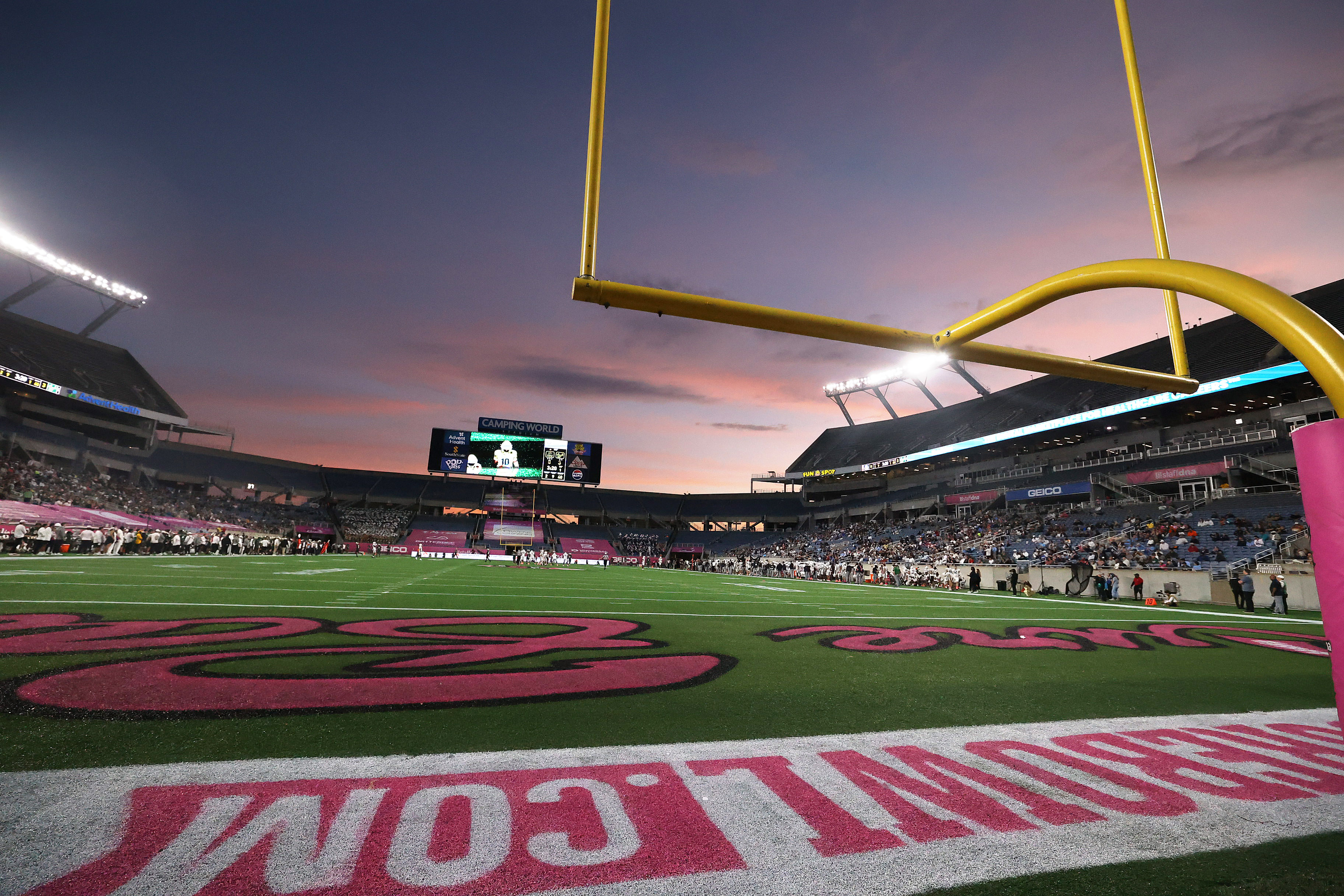 The sun sets during the Cure Bowl game of University...
