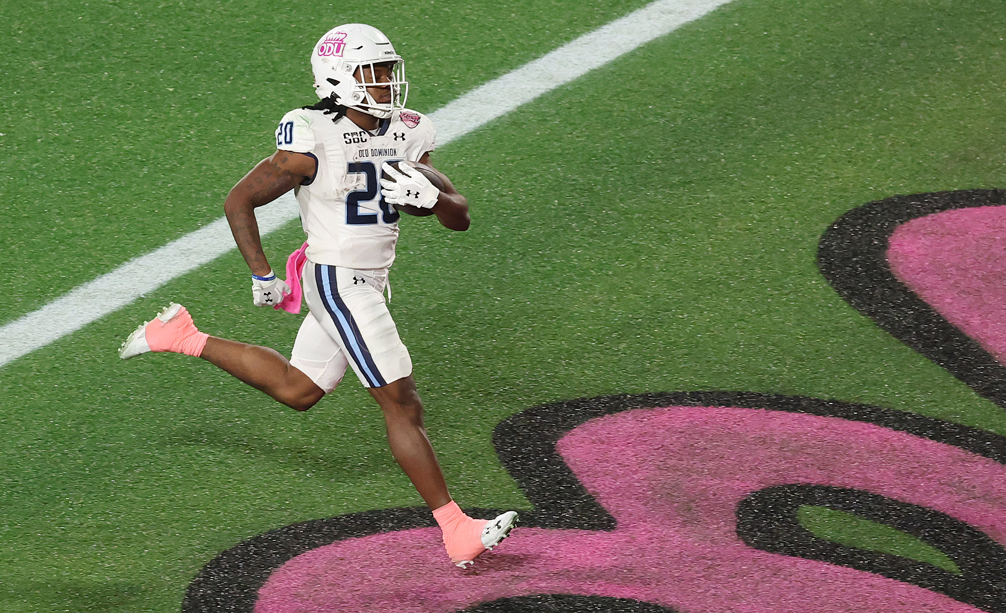 Old Dominion running back Trequan Jones (20) runs untouched into...