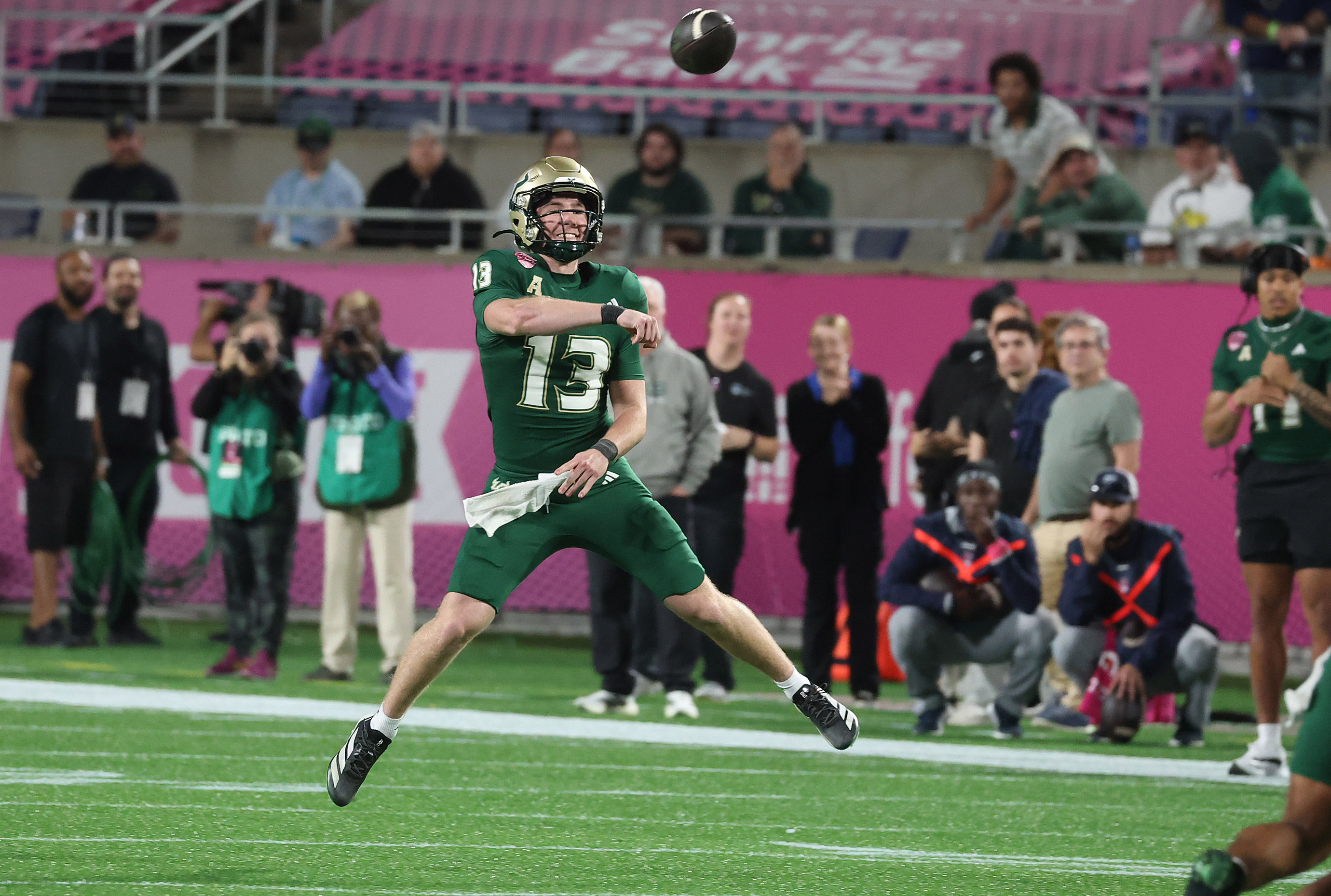 UCF quarterback Locklan Hewlett throws during the Cure Bowl game...