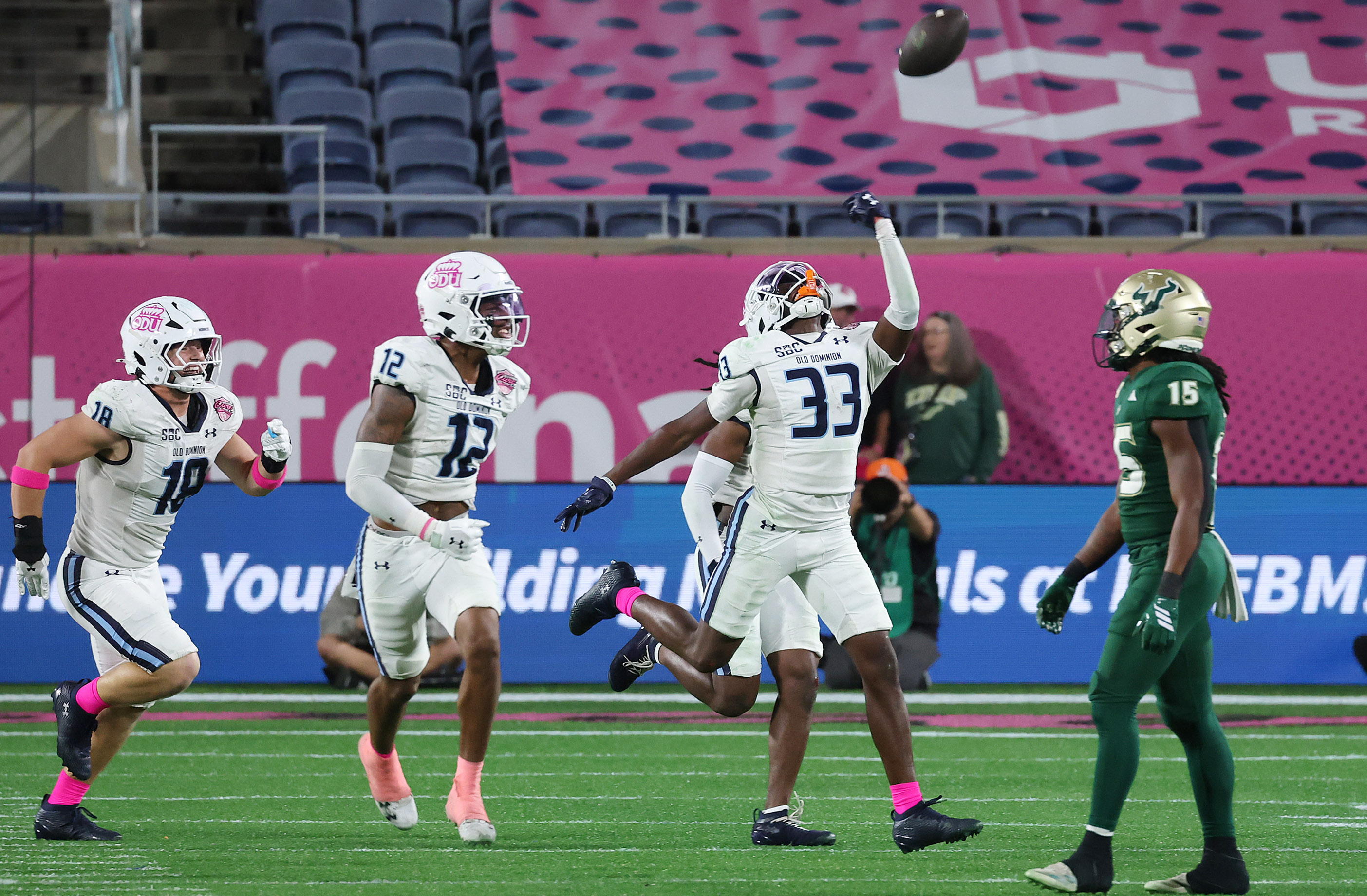 Old Dominion safety Daevon Iles (33) tosses the ball in...