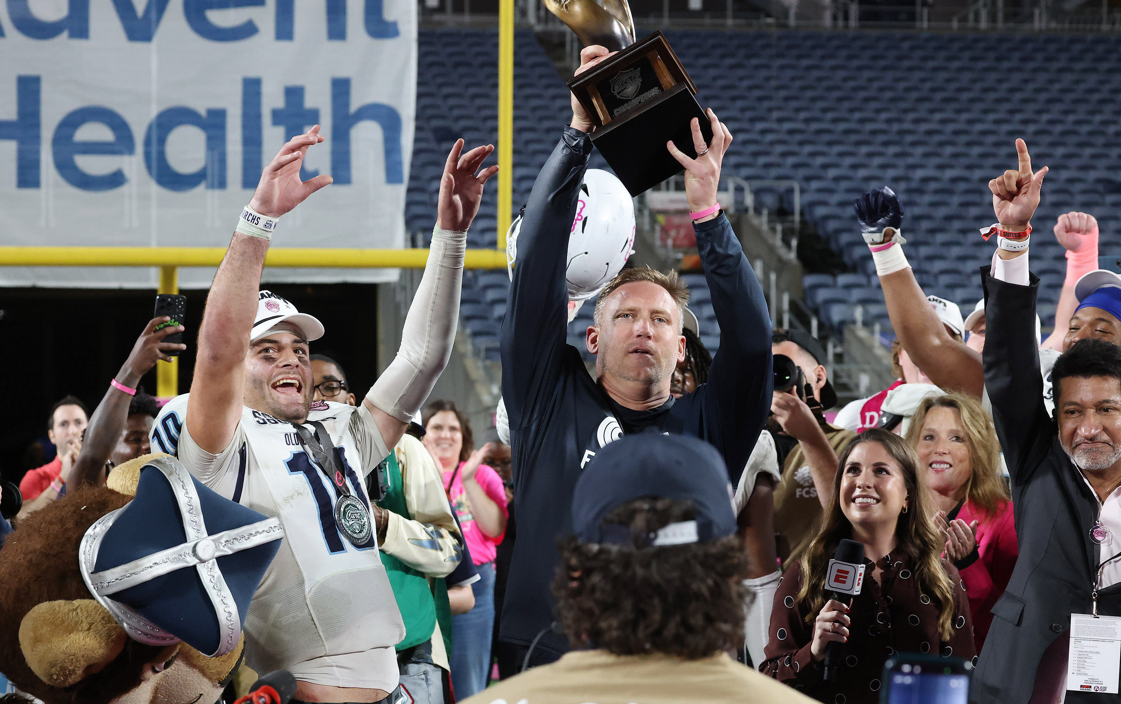 Old Dominion quarterback Quinn Henicle (10) and head coach Ricky...