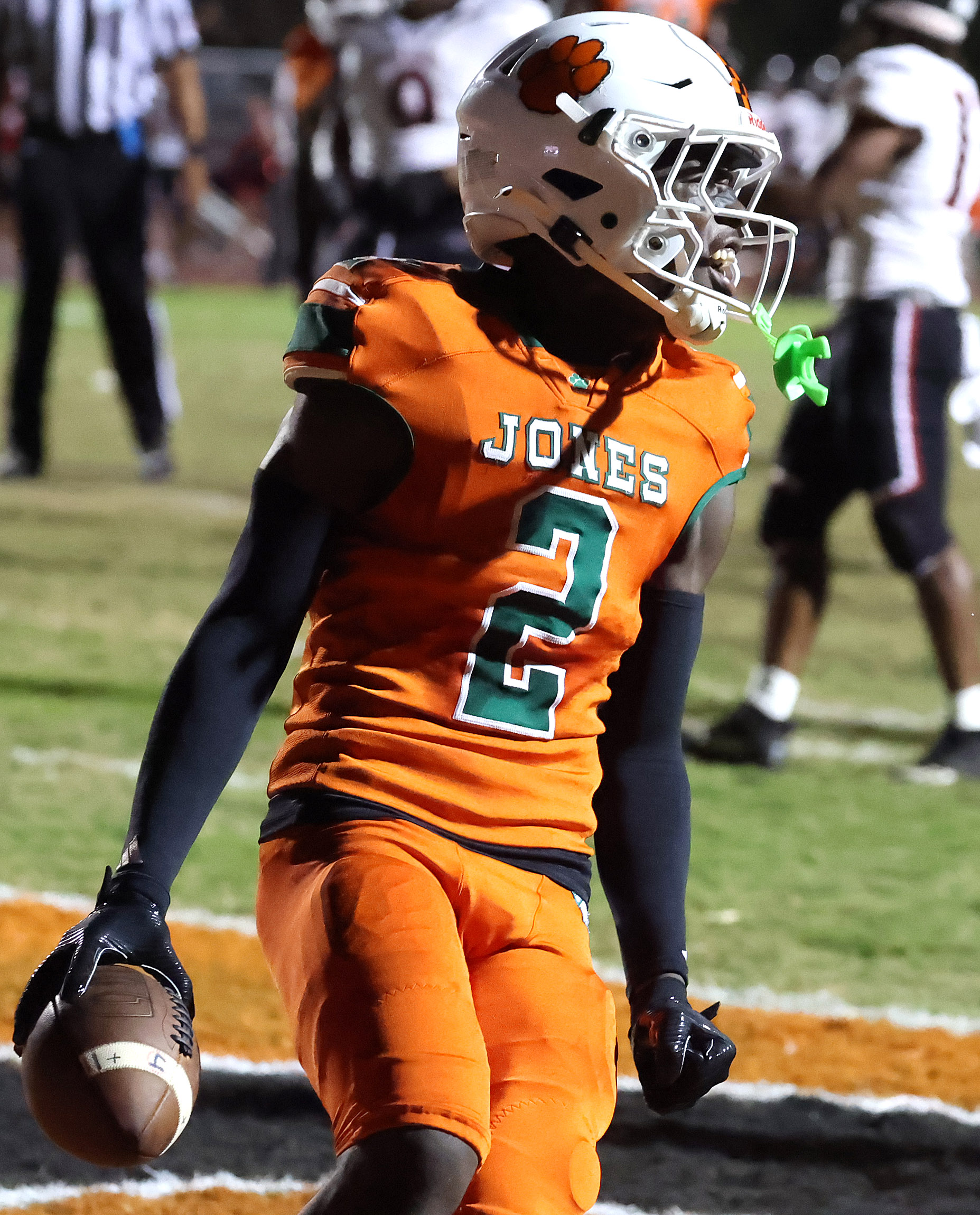 Jones wide receiver Larry Miles celebrates after a touchdown during...
