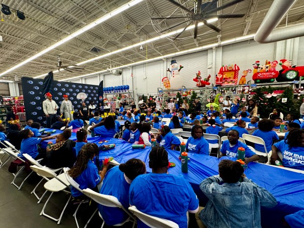 One hundred children from three branches of the Boys and Girls Clubs of Central Florida were gifted a shopping spree at a Walmart with Orlando Magic teammates Paolo Banchero and Tristan da Silva on Thursday night. (Jason Beede/Orlando Sentinel)