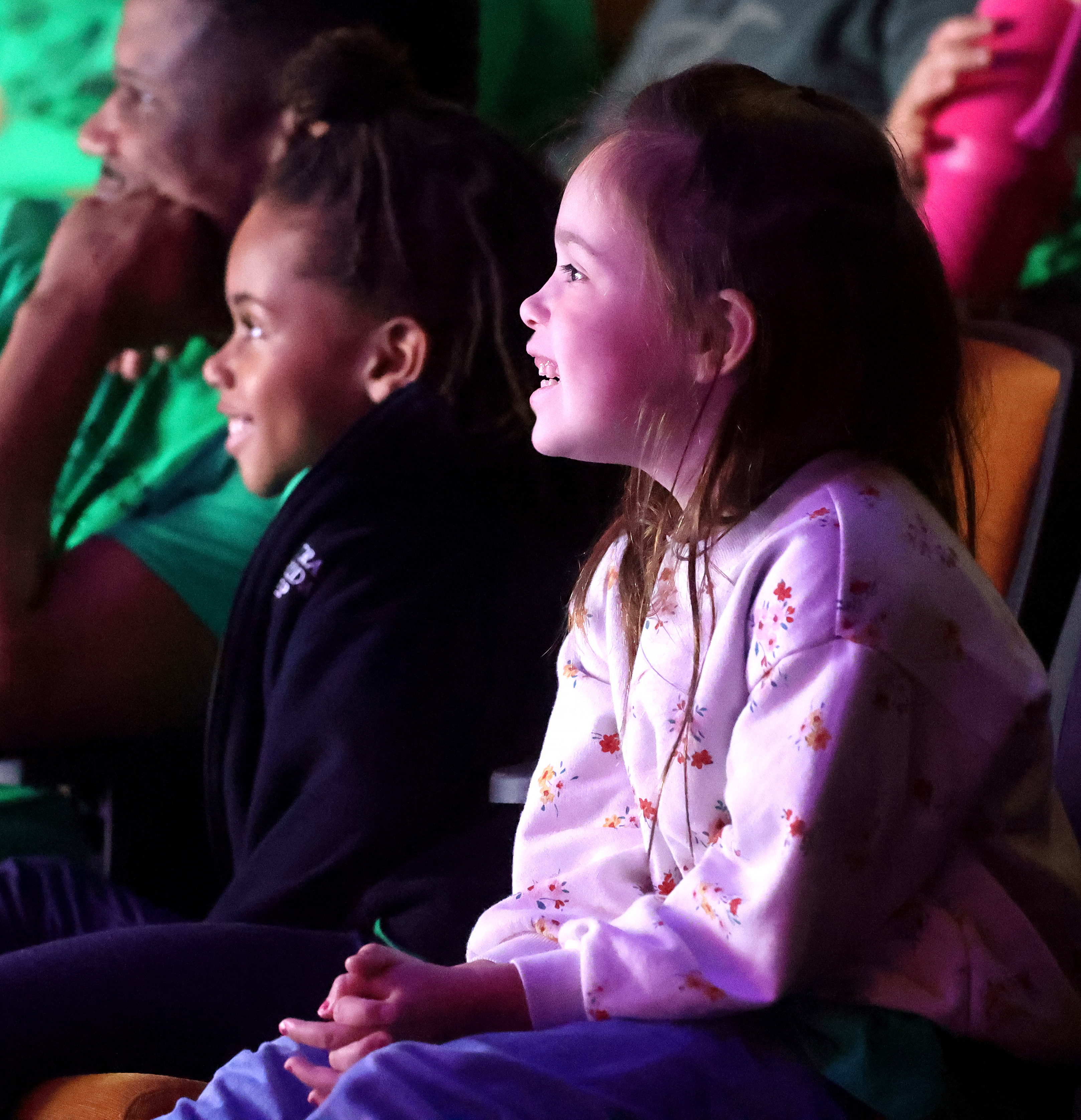 Young students from Central Florida Preparatory School in Apopka react...