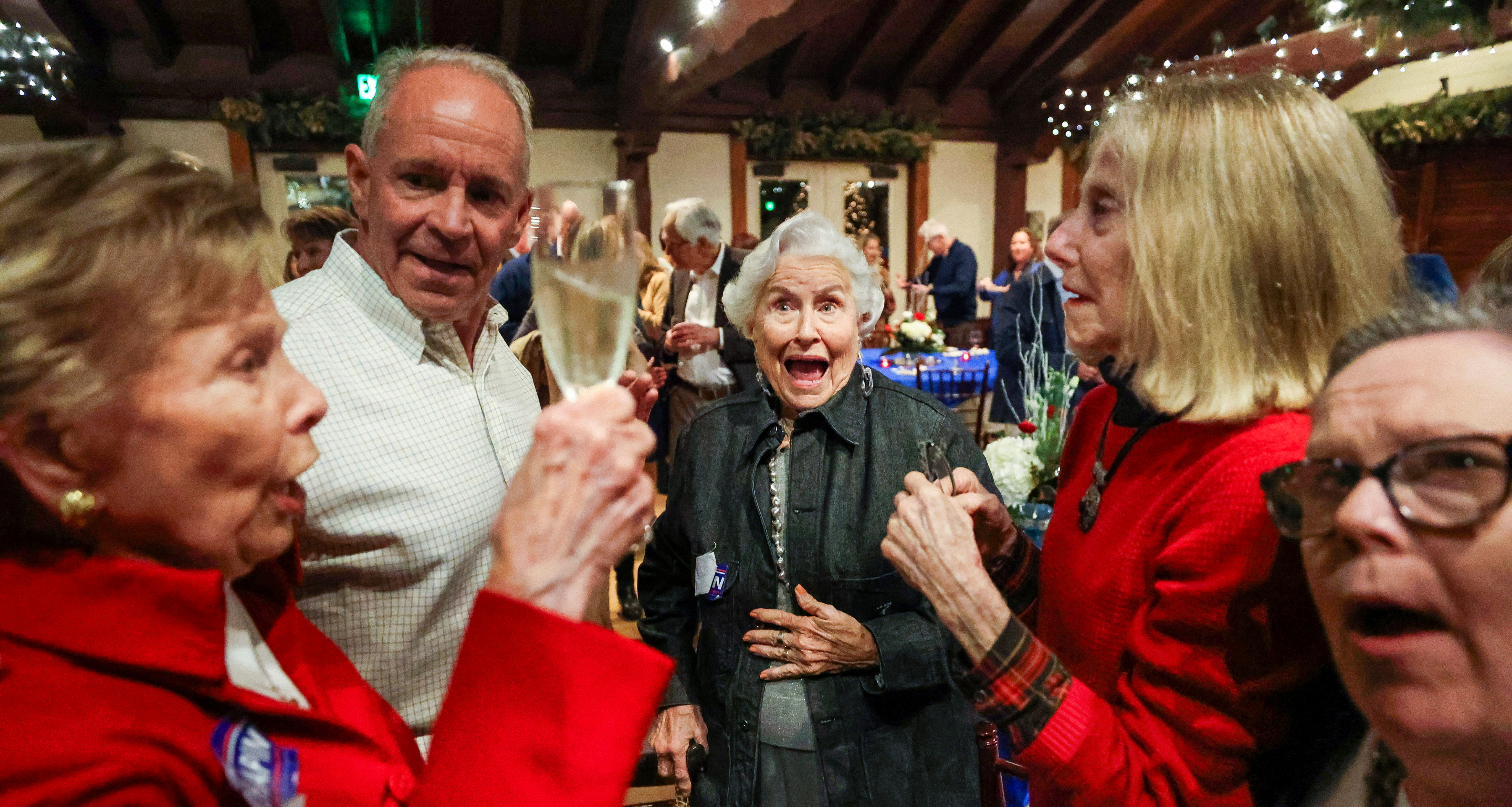Former Orange County Mayor Linda Chapin reacts with friends upon...