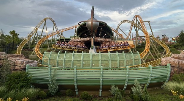 Some of the first Stardust Racer trains full of paying customers on Oct. 4, 2025, move from the roller coaster's loading station into the first launching maneuver. It was the first day of operation for the public since the Sept. 17 death of Kevin Rodriguez Zavala, a visitor at the theme park. (Dewayne Bevil/Orlando Sentinel)