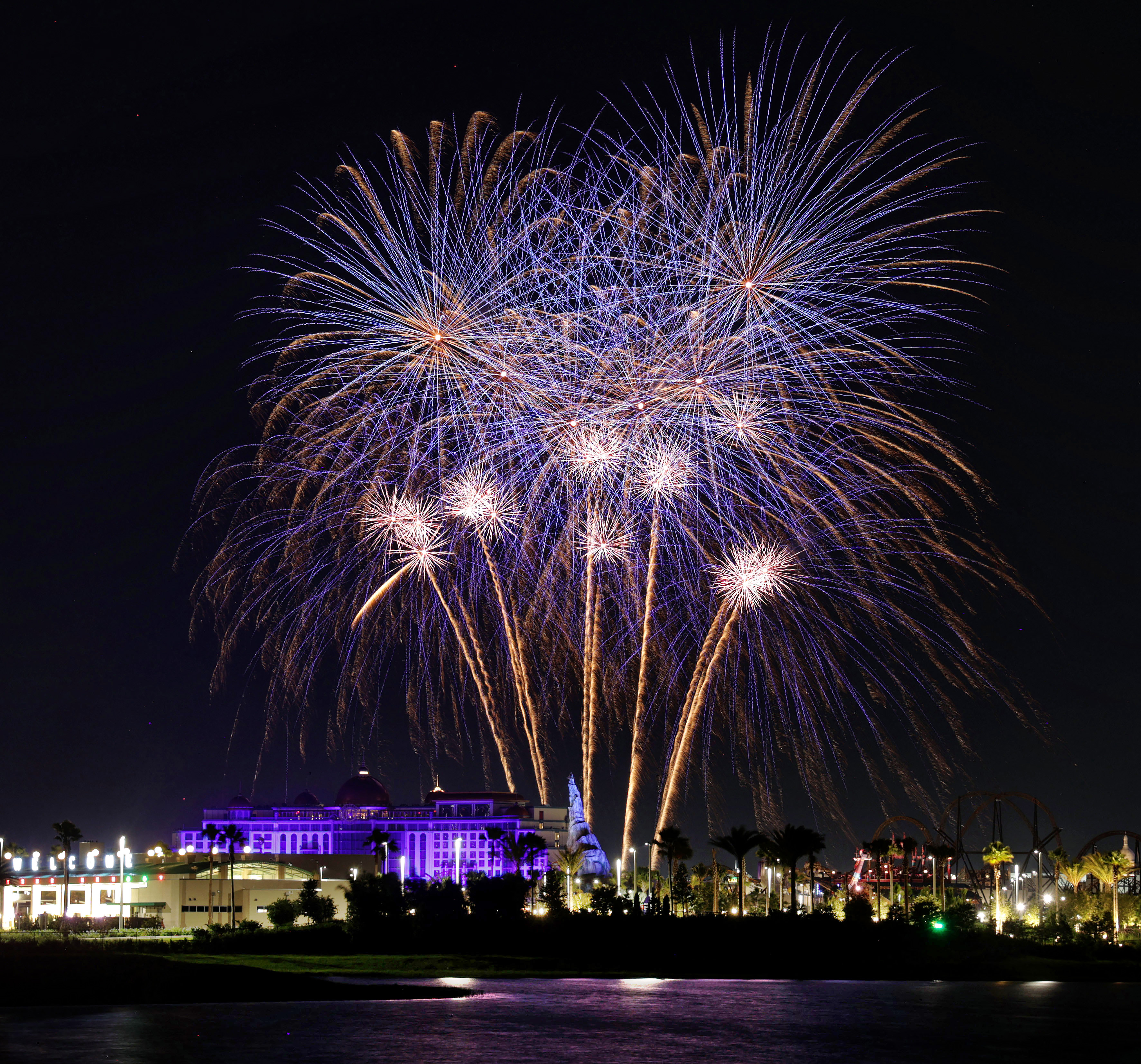 Fireworks launch over Universal's Epic Universe on May 21, 2025,...