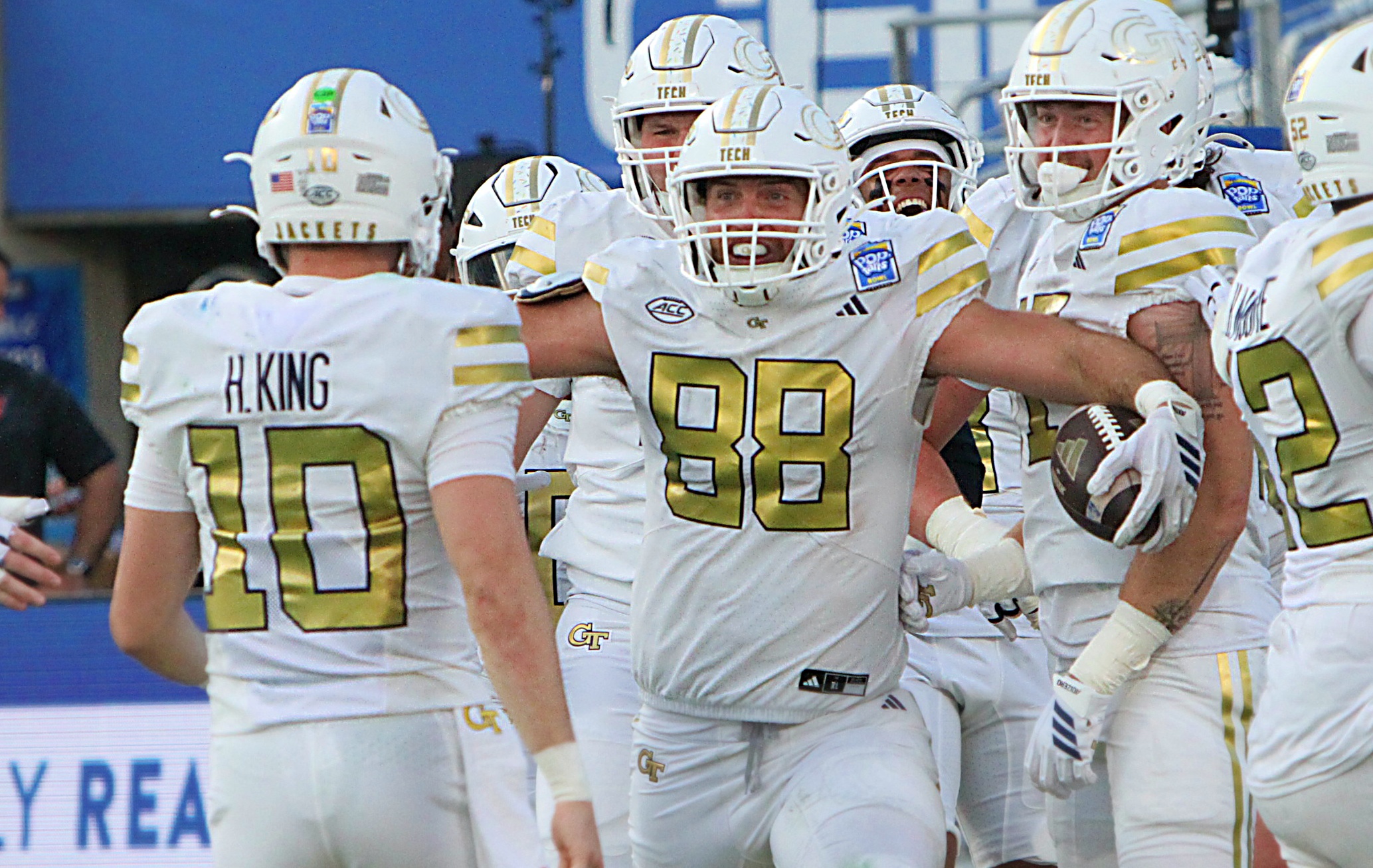 Georgia Tech tight end JT Byrne (88) is met by...
