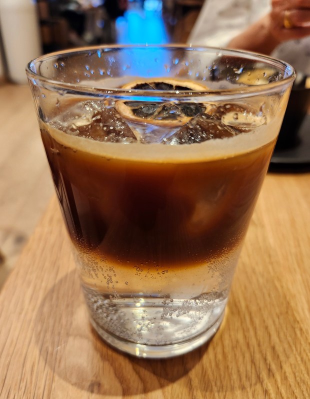 Quite possibly my favorite-ever "craft coffee beverage," Haan's refreshing Endless Summer drinks like an herbaceous cocktail, a beautifully layered refresher of espresso and elderflower tonic. (Amy Drew Thompson/Orlando Sentinel)