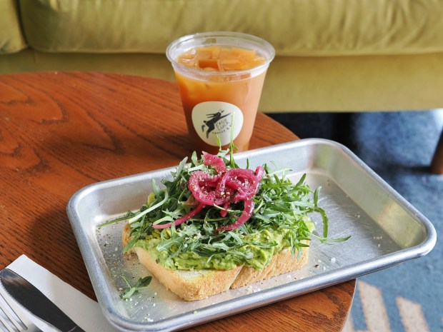 Avo toast, pickled onions and a beverage at Easy Luck Coffee & Bodega. (Photo courtesy Lisa Wilk/TasteCookSip.com)