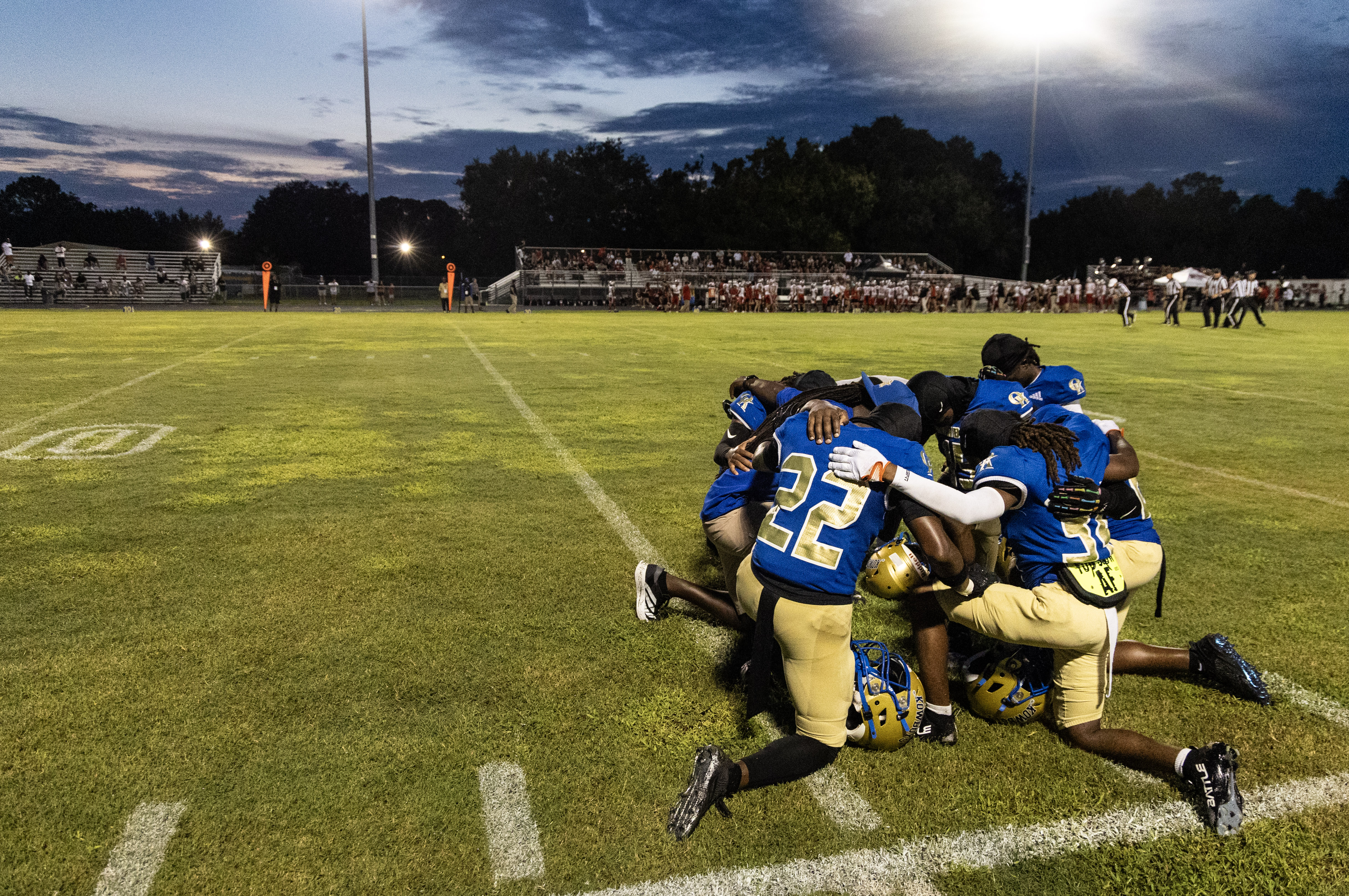 Osceola High Schoolâs players huddle up and say a prayer...