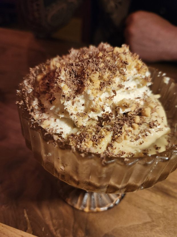 Butterscotch budino at Osteria Ester, the sixth concept from Good Salt Restaurant group and a very personal undertaking for Chef/Partner Michael Cooper, who will continue overseeing ops at The Osprey in Baldwin Park, as well. (Amy Drew Thompson/Orlando Sentinel)