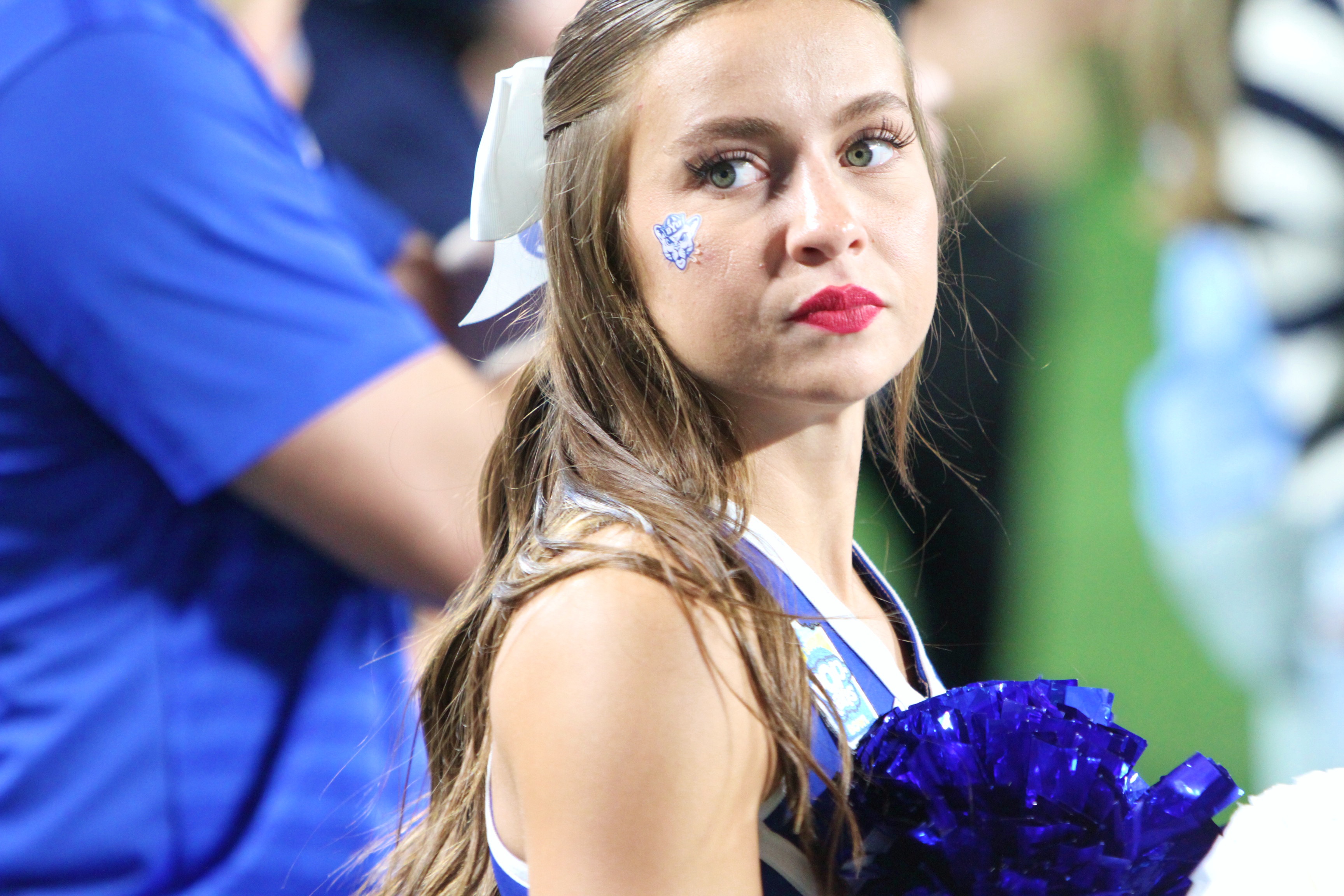 A BYU cheerleader shows concern during Georgia Tech's final drive...