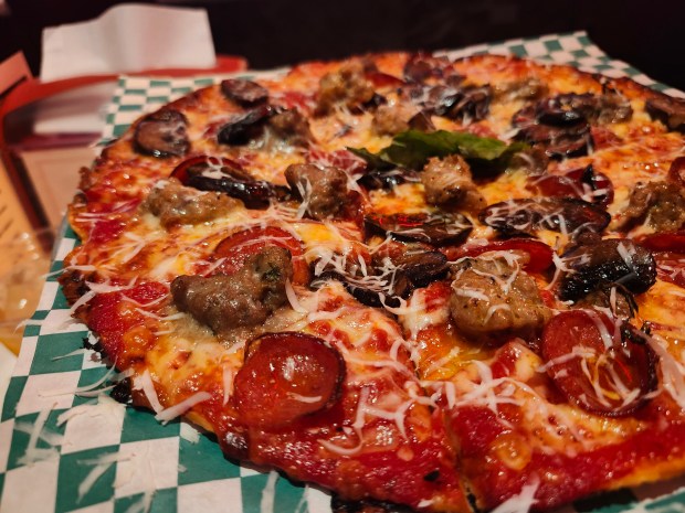 This is the MeatX3, which includes pepperoni, meatball and sweet sausage. These literally cook on the pie, infusing it with heady, meaty drippings. I normally don't order such carnivorous concoctions in a pizza joint. I will never not order this at Nuri's. (Amy Drew Thompson/Orlando Sentinel)