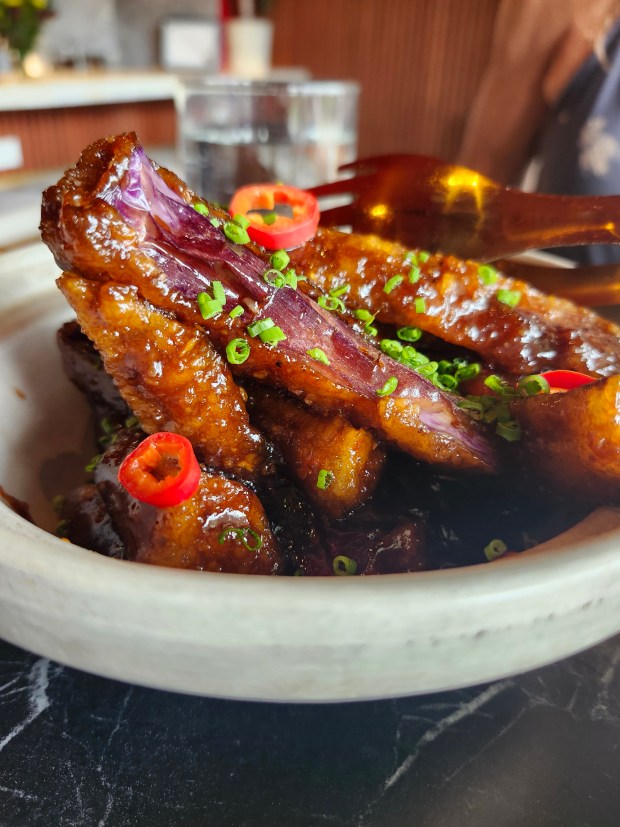 The Chinese eggplant clay pot, said our server is the "most slept-on" dish at Yao's, though it called my name instantly. Sticky with gingery, garlicky soy, lightly crisp from a dusting of potato flower, with a hint of heat from Fresno chilies, for me, it'd be a must-order. (Amy Drew Thompson/Orlando Sentinel)