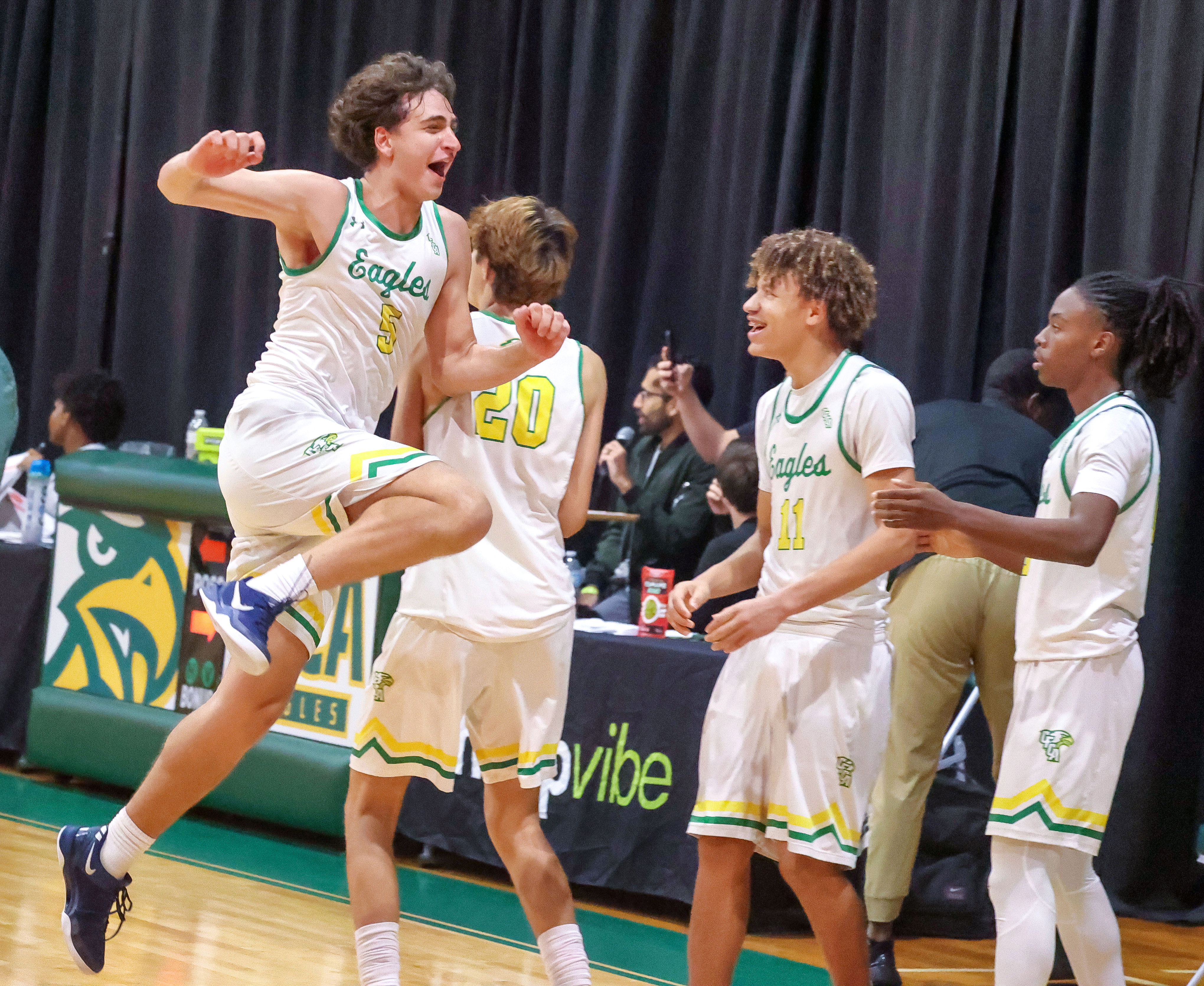 Central Florida Christian Academyâs #5 Lucas Robertson jumps for joy...