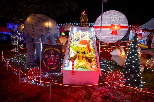 Yuletide Yoda's Galactic Adventure leans into Star Wars theming with inflatables, animatronics and illuminated elements from a galaxy far, far away at 110 Area Court in Winter Park on Dec. 14, 2025. (Patrick Connolly/Orlando Sentinel)