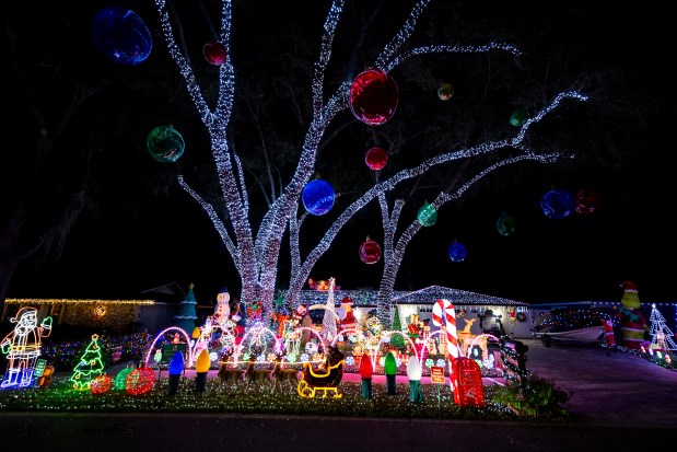 The Zurich Griswold display features 150,000 lights at 4101 Summerwood Avenue in Orlando on Dec. 15, 2025. (Patrick Connolly/Orlando Sentinel)
