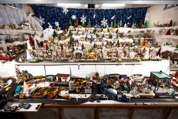 This home in a rural neighborhood east of Orlando features a garage display of trains and dozens of miniature houses and stores at 20404 Marlin St. in Orlando on Dec. 15, 2025. (Patrick Connolly/Orlando Sentinel)