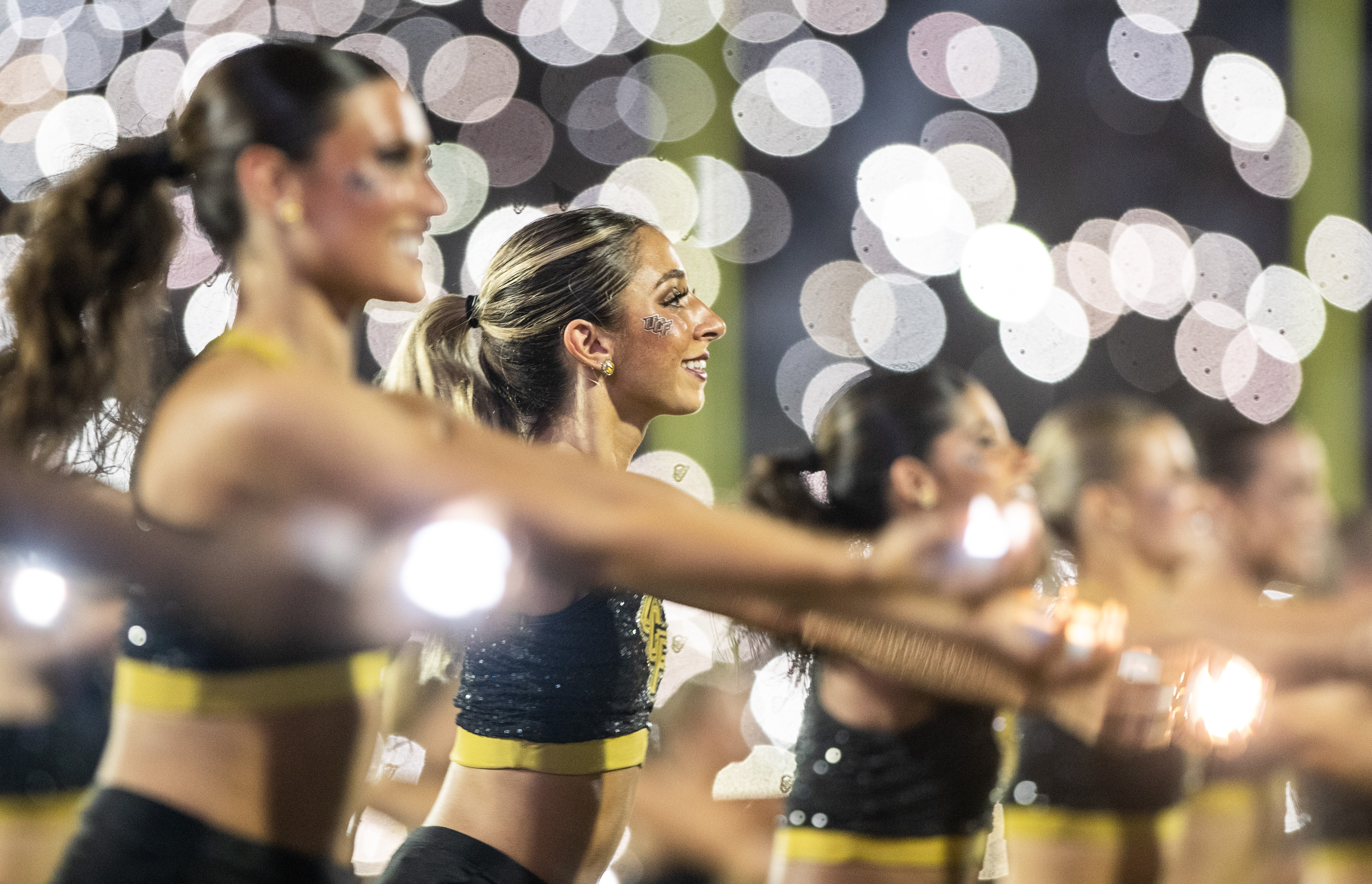 UCF Knights cheerleaders entertain the crowd during the college football...