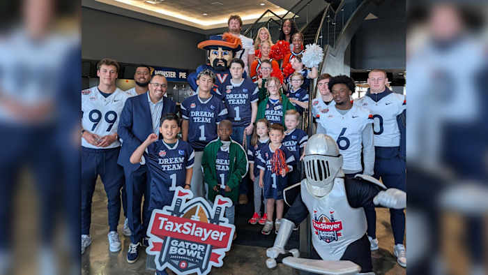 Players from Missouri, Virginia meet local children from Dreams Come True ahead of Gator Bowl clash