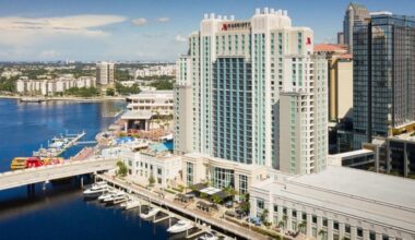 Aerial view of the JW Marriott Tampa Water Street and Tampa Marriott Water Street overlooking the waterfront and marina in downtown Tampa.