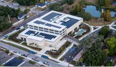 Aerial view of the Fair Oaks Recreation Center in East Tampa showing solar panels on the roof and surrounding neighborhood