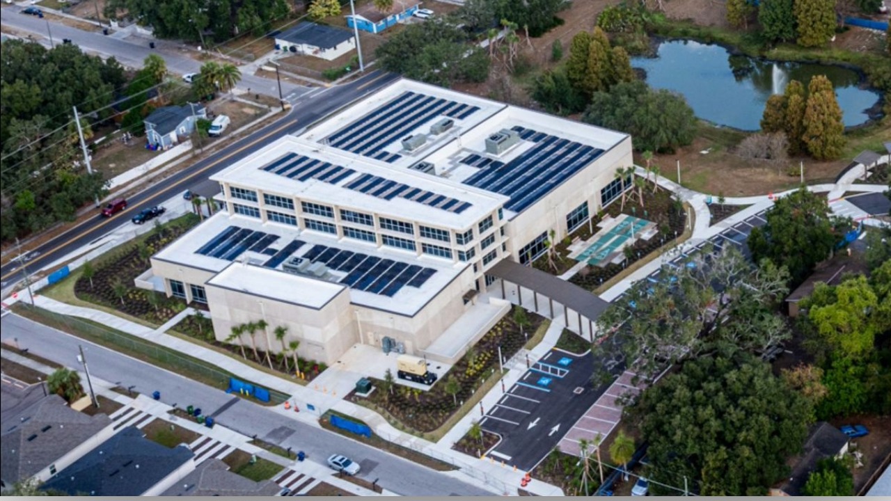 Aerial view of the Fair Oaks Recreation Center in East Tampa showing solar panels on the roof and surrounding neighborhood