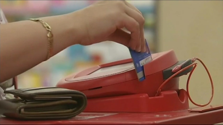 File: Credit card being swiped.