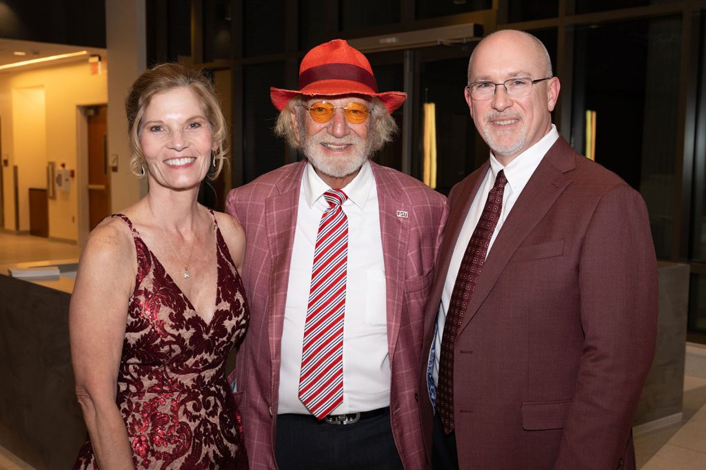 Dr. Herbert Wertheim (middle) with Dean Michael Hartline and Marsha Hartline.