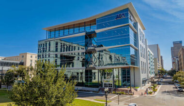 Jacksonville advocacy groups deliver ‘coal for Christmas’ to JEA in rally against coal, rate hikes