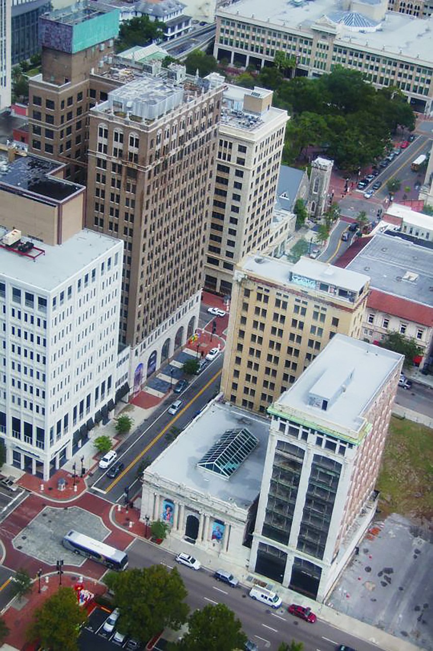 Tallest building at left, The Barnett National Bank Building, now called The Residences at Barnett. Right, the Laura Street Trio.