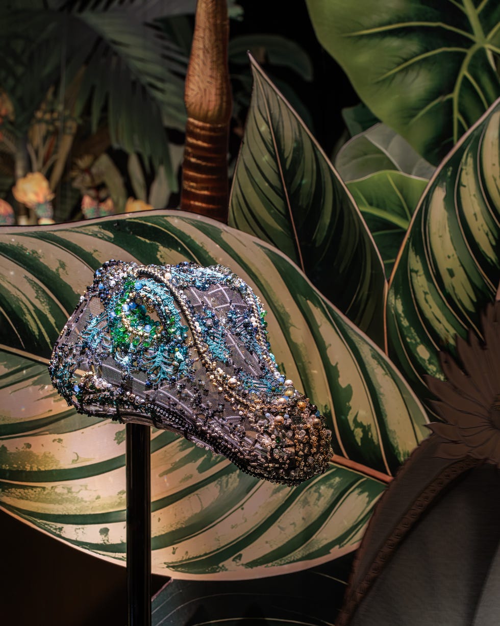 decorative headpiece resembling an animal with intricate beadwork