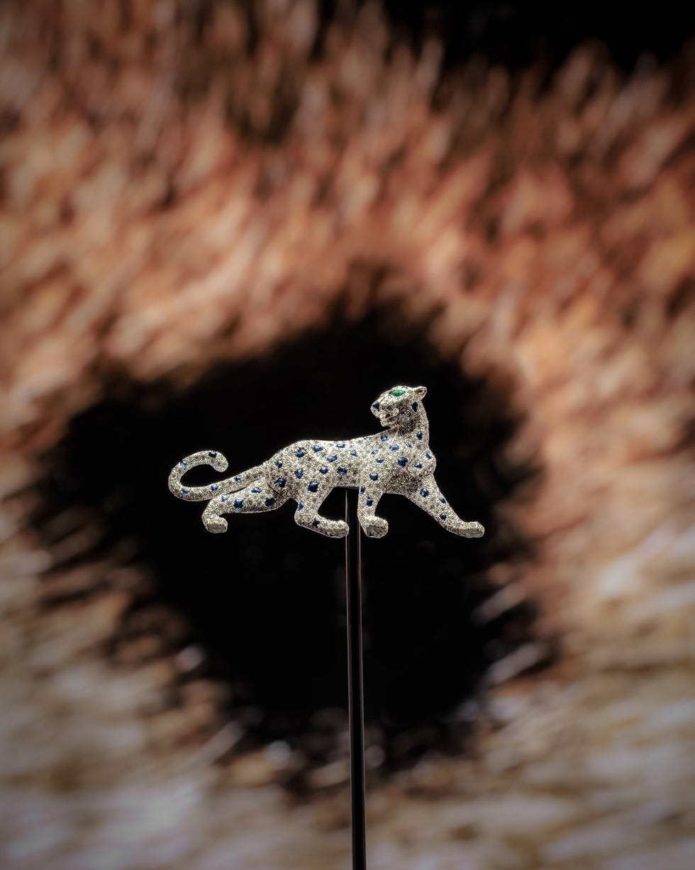 jewelry piece featuring a jeweled panther design jewelry piece featuring a jeweled panther design