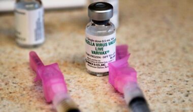 A chickenpox (also known as varicella) vaccine sits next to syringes and ready for a student at a free immunization clinic. (File photo)