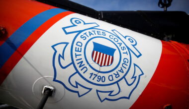 <i>Marco Bello/Reuters via CNN Newsource</i><br/>The US Coast Guard's logo is seen in Fort Lauderdale
