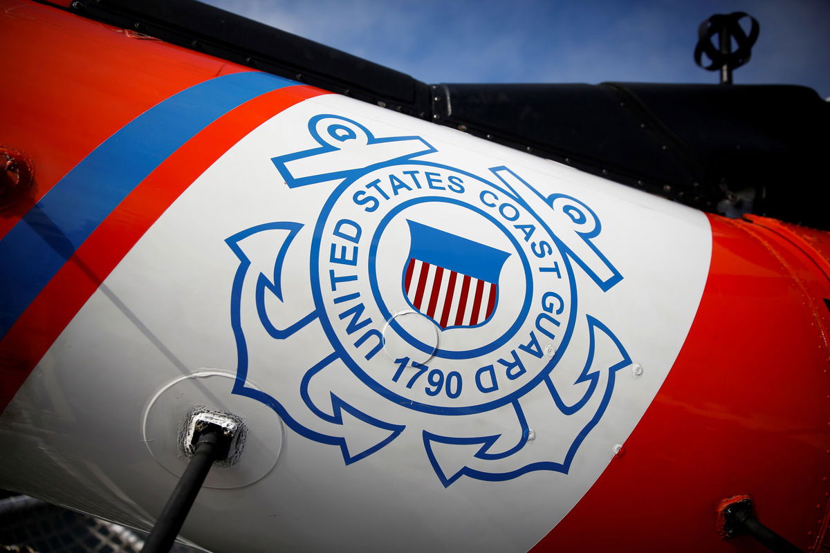 <i>Marco Bello/Reuters via CNN Newsource</i><br/>The US Coast Guard's logo is seen in Fort Lauderdale