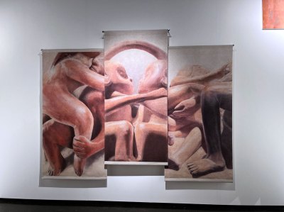 A three panel painting of details of pre-Columbia ceramics.