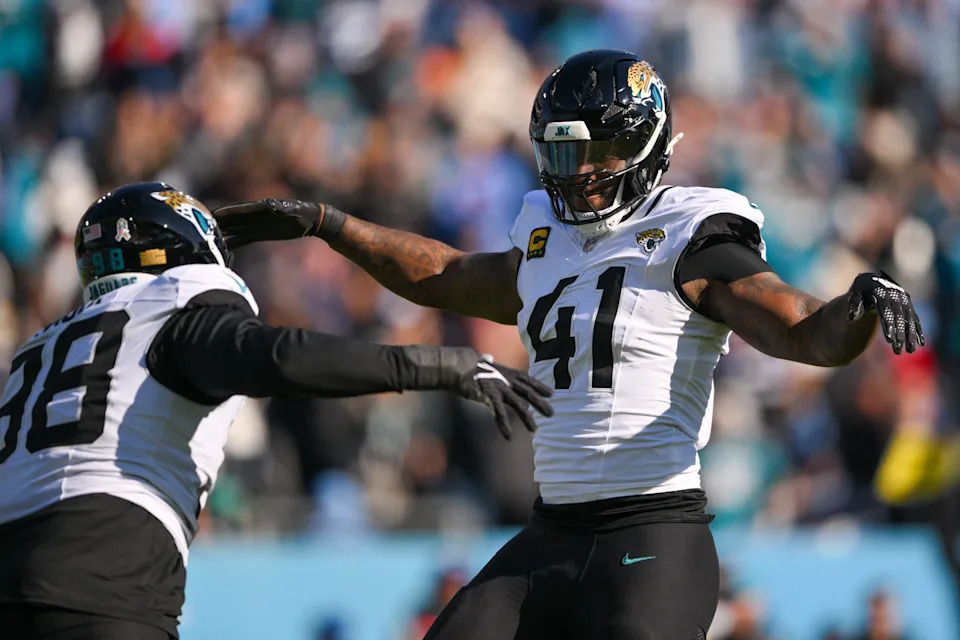 Nov 30, 2025; Nashville, Tennessee, USA; Jacksonville Jaguars defensive end Josh Hines-Allen (41) reacts after a sack against the Tennessee Titans during the first half at Nissan Stadium. Mandatory Credit: Steve Roberts-Imagn Images