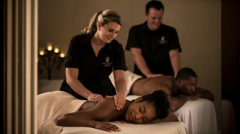 Couples getting a massage at The Ritz-Carlton Spa, Orlando, Grande Lakes
