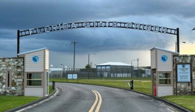 Clouds hover over the entrance of the Florida State Prison in Starke, Fla., on Aug. 3, 2023. (AP Photo/Curt Anderson, File)