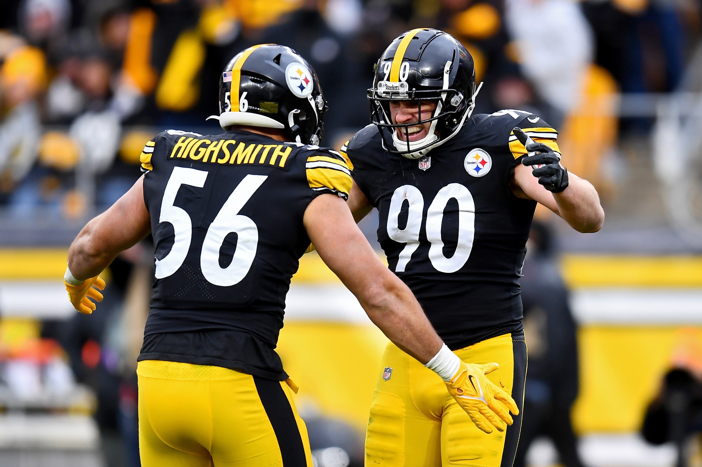 PITTSBURGH, PENNSYLVANIA - DECEMBER 19: T.J. Watt #90 and Alex Highsmith #56 of the Pittsburgh Steelers celebrate a sack against the Tennessee Titans in the third quarter of the game at Heinz Field on December 19, 2021 in Pittsburgh, Pennsylvania. (Photo by Joe Sargent/Getty Images)