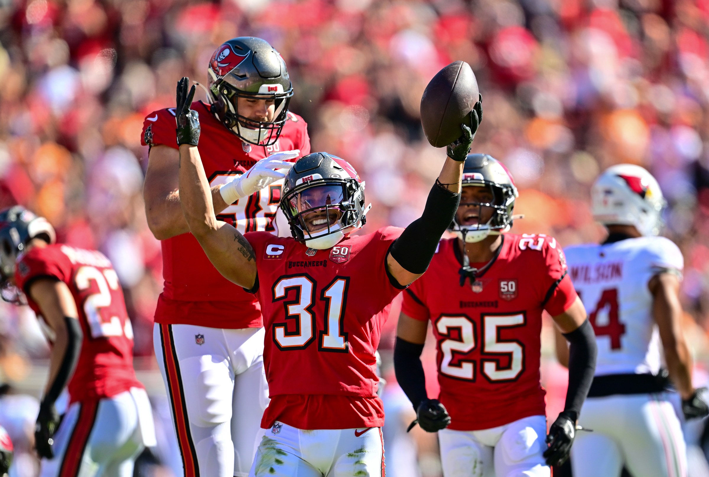 TAMPA, FLORIDA - NOVEMBER 30: Antoine Winfield Jr. #31 of the Tampa Bay Buccaneers celebrates a interception against the Arizona Cardinals during the first quarter at Raymond James Stadium on November 30, 2025 in Tampa, Florida. (Photo by Julio Aguilar/Getty Images)