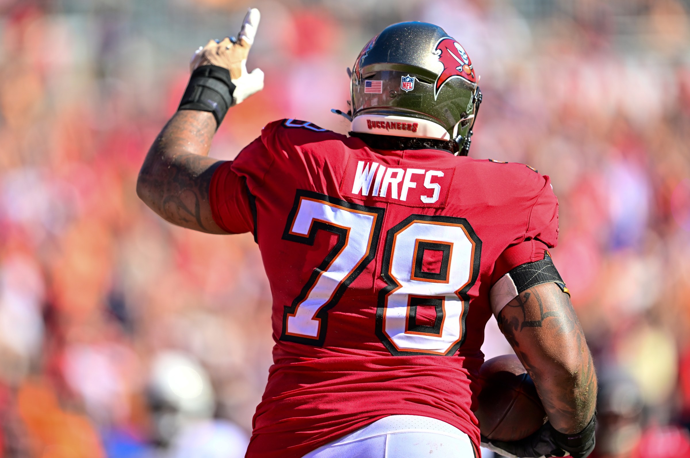 TAMPA, FLORIDA - NOVEMBER 30: Tristan Wirfs #78 of the Tampa Bay Buccaneers celebrates a touchdown against the Arizona Cardinals during the second quarter at Raymond James Stadium on November 30, 2025 in Tampa, Florida. (Photo by Julio Aguilar/Getty Images)