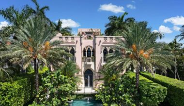 Depicted is an opulent gothic-style mansion in Coconut Grove.