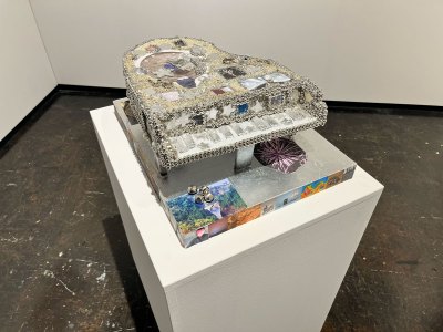 A mixed-media sculpture of a piano.
