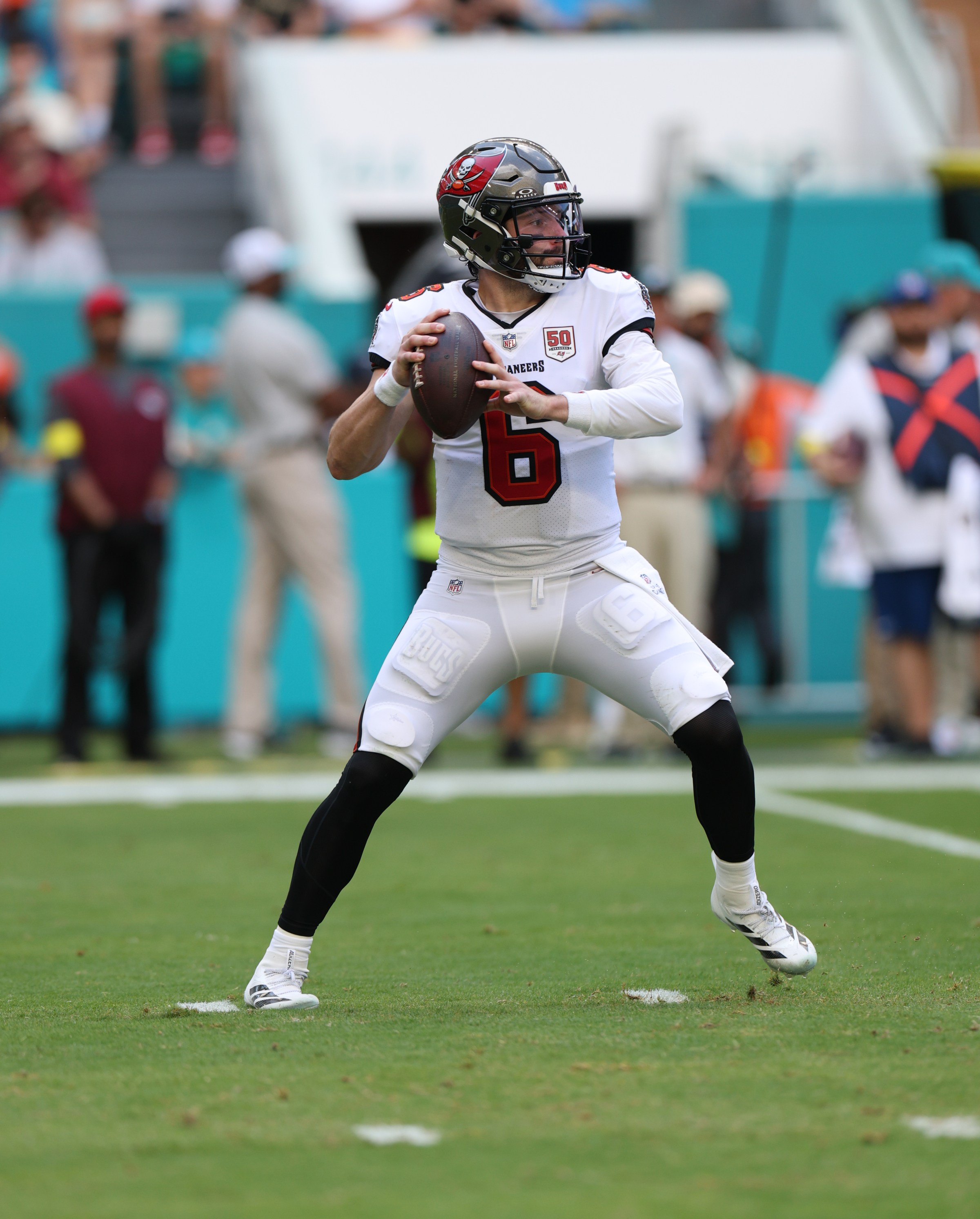 Dec 28, 2025; Miami Gardens, Florida, USA; Tampa Bay Buccaneers quarterback Baker Mayfield (6) throws downfield during the second quarter against the Miami Dolphins at Hard Rock Stadium. Mandatory Credit: Nathan Ray Seebeck-Imagn Images