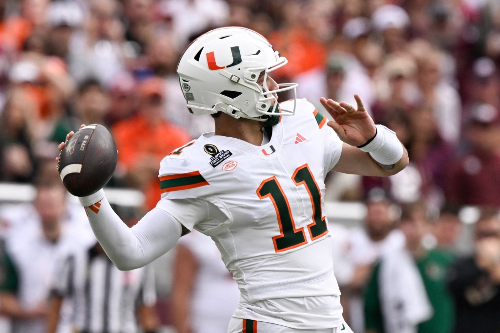 Miami Hurricanes quarterback Carson Beck (11) makes a pass against the Texas A&M Aggies.