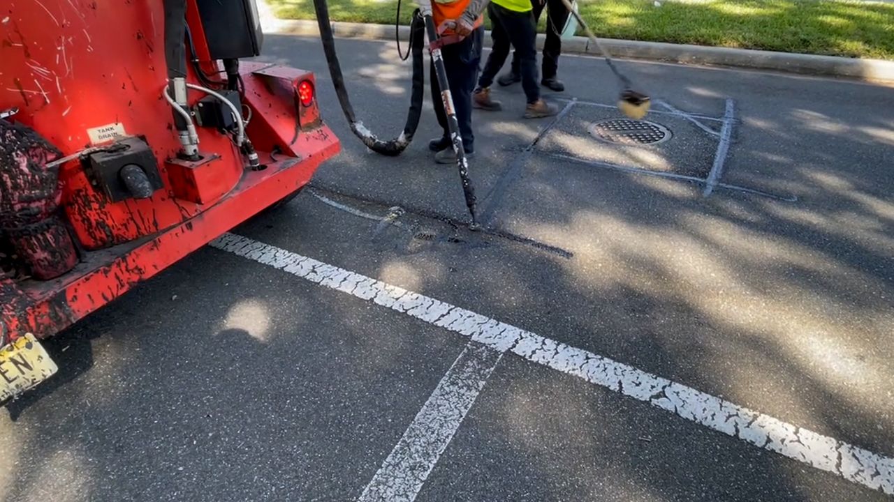 Seeing those black lines in the road? It’s microsurfacing