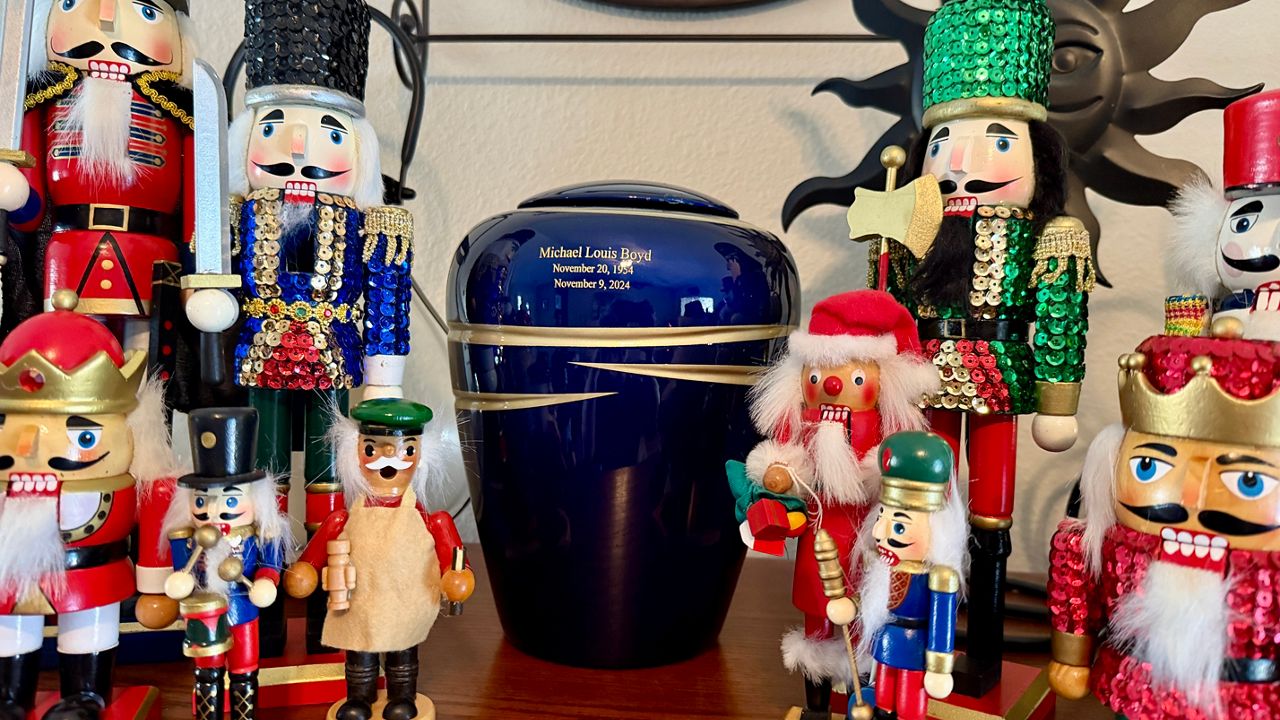 An urn containing the ashes of Mike Boyd. (Spectrum News/Erin Murray)